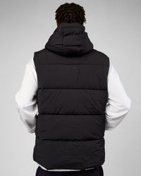 Man wearing Base Puffer Vest - Black | Model:Okello | Size:L