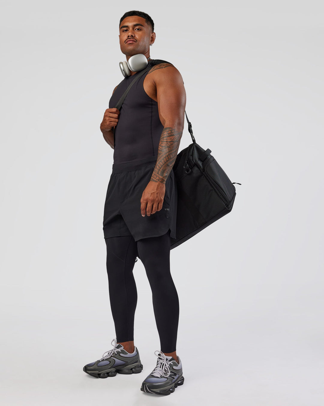 Man wearing BaseTech 26" Leggings - Black | Model:Xav | Size:L
