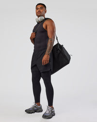 Man wearing BaseTech 26" Leggings - Black | Model:Xav | Size:L