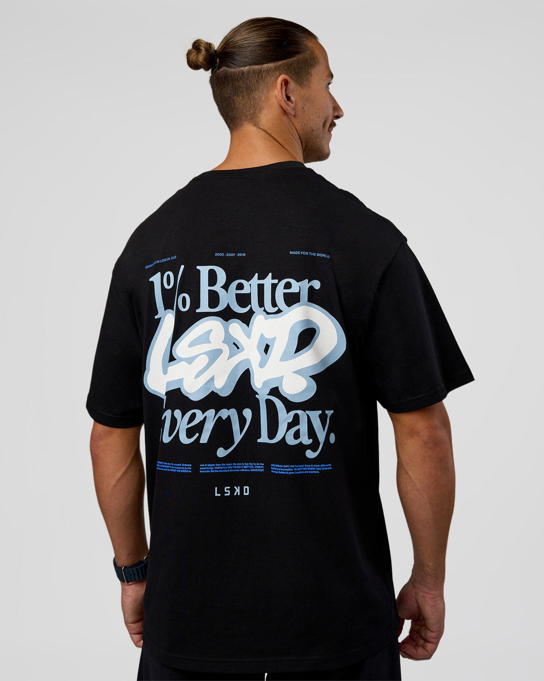 Man wearing Break Through FLXCotton Oversized Tee - Black-Open Air | Model:Jaiden | Size:L