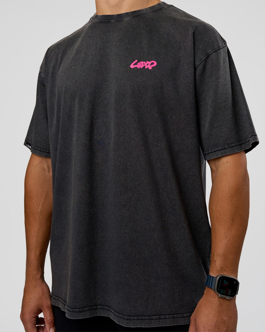 Man wearing Break Through FLXCotton Oversized Tee - Black-Plum Caspia | Model:Jaiden | Size:L