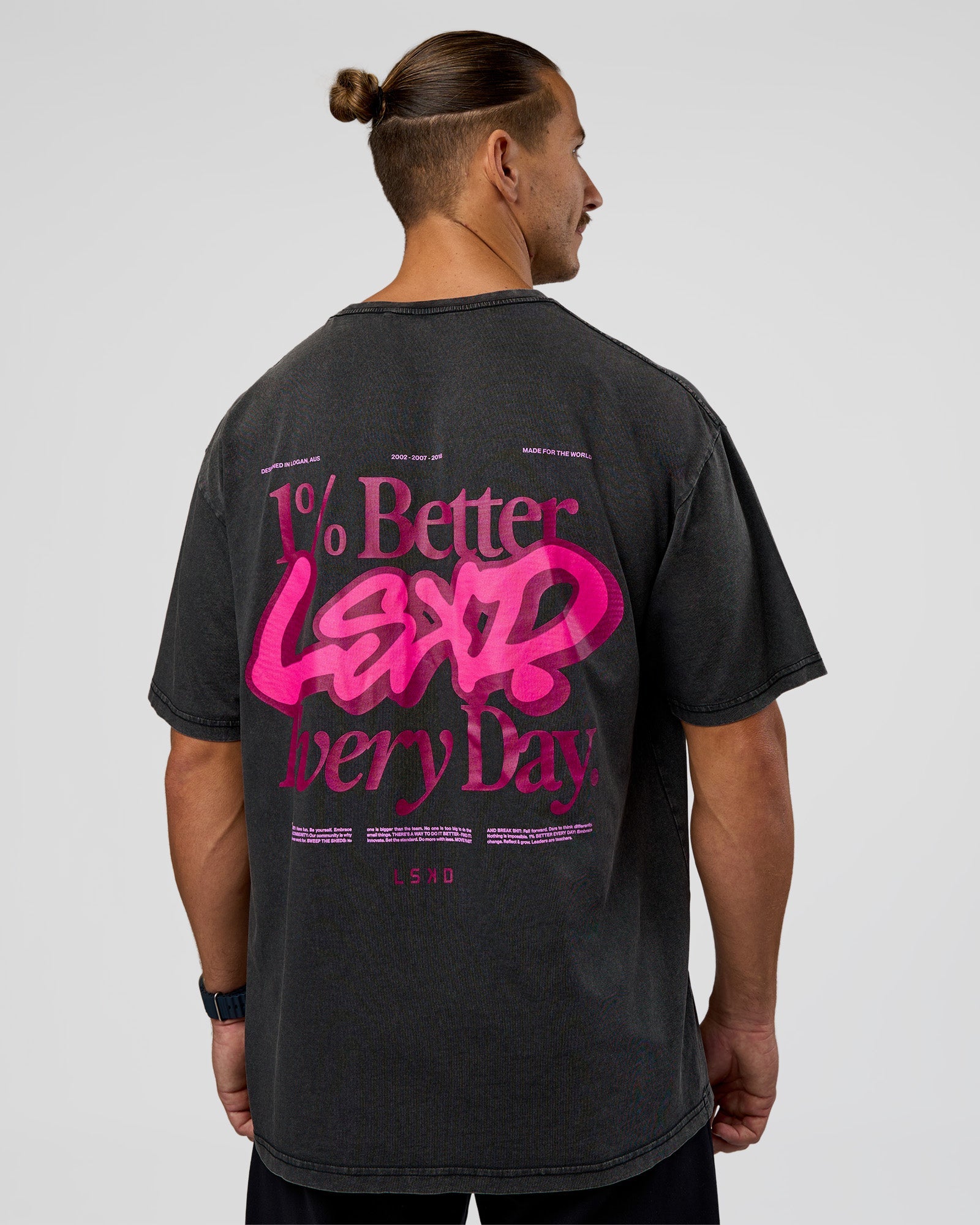 Man wearing Break Through FLXCotton Oversized Tee - Black-Plum Caspia | Model:Jaiden | Size:L