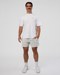 Man wearing Break Through FLXCotton Oversized Tee - White-Pale Lilac | Model:Adam | Size:L