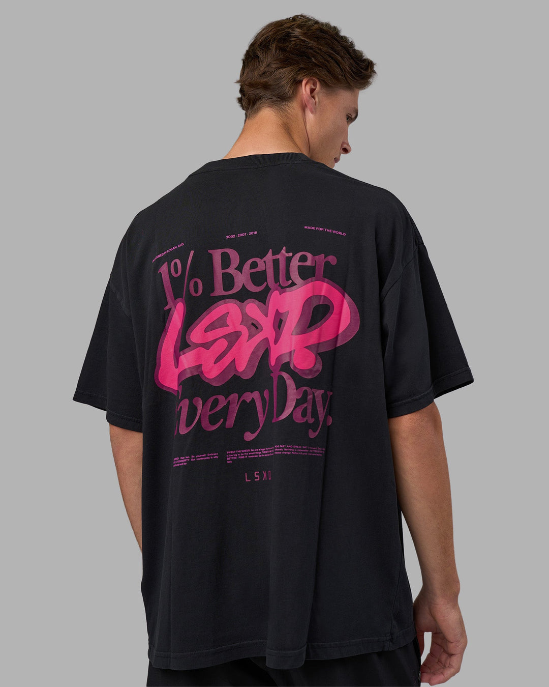 Man wearing Break Through Heavyweight Oversized Tee - Black Washed-Plum Caspia | Model:Brandon | Size:L