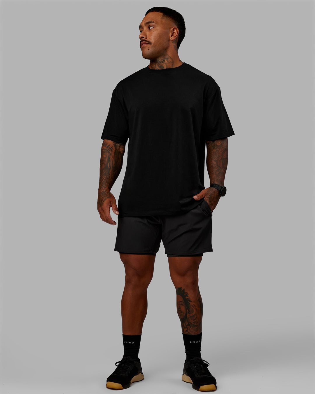 Man wearing Challenger 6&quot; Lined Performance Shorts - Pirate Black