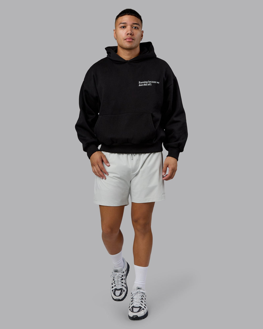 Man wearing Checklist Oversized Hoodie - Black | Model:Kaelyb | Size:L