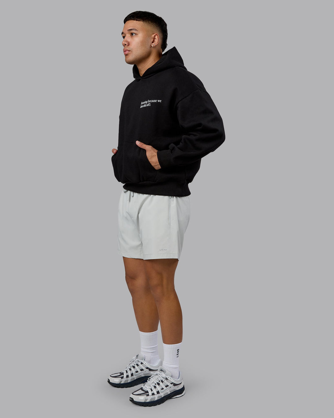 Man wearing Checklist Oversized Hoodie - Black | Model:Kaelyb | Size:L