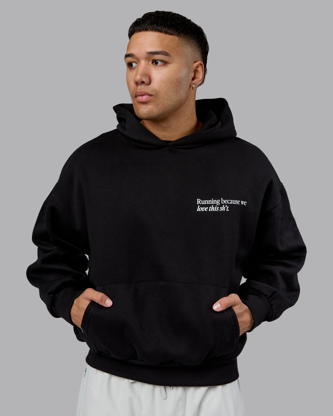 Man wearing Checklist Oversized Hoodie - Black | Model:Kaelyb | Size:L
