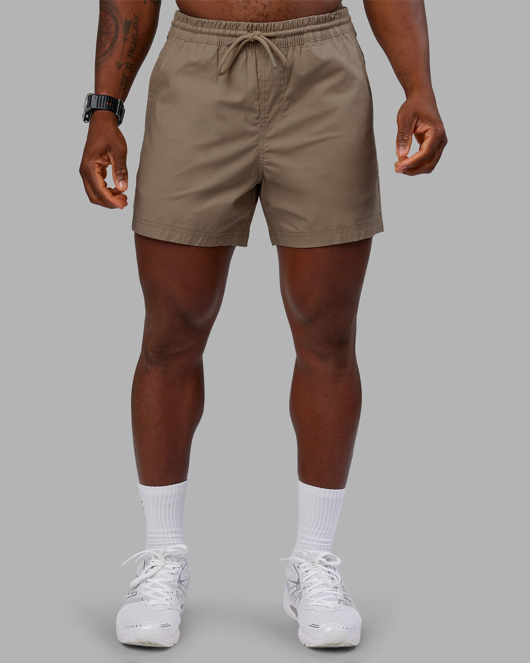 Man wearing Daily 5" Short - Greige | Model:Sam | Size:L