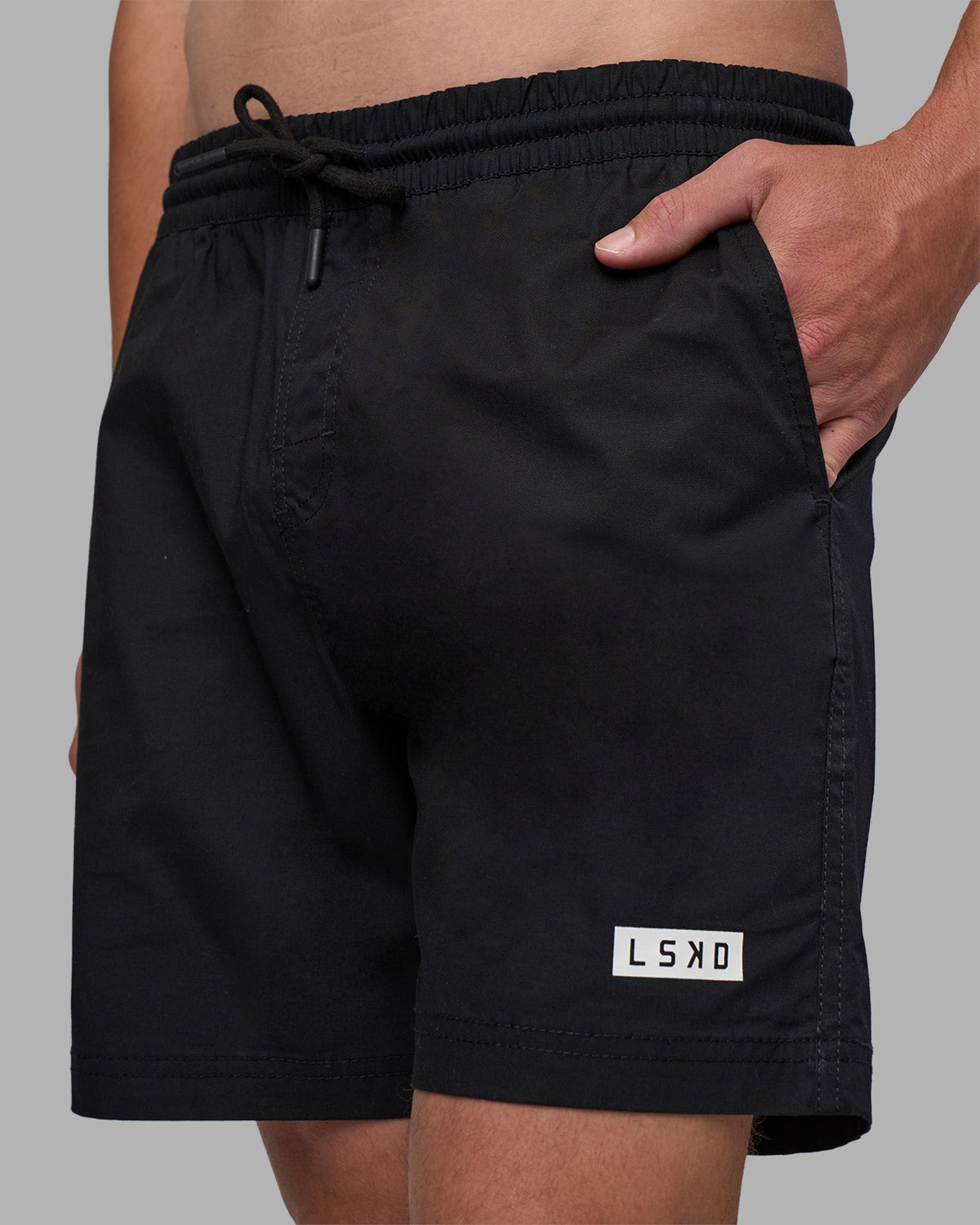 Man wearing Daily 7" Short - Black-White | Model:Brandon | Size:L - view 1