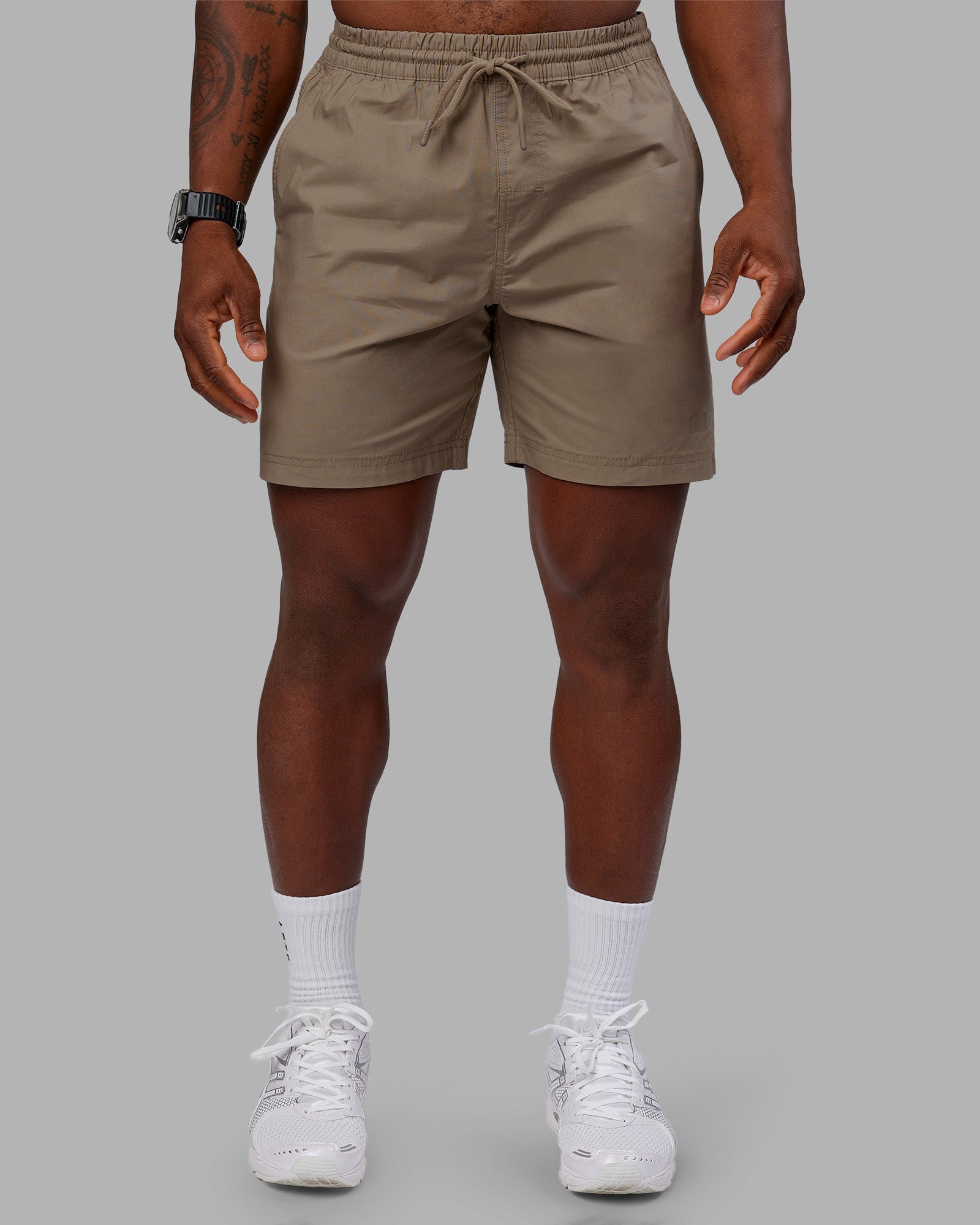Man wearing Daily 7" Short - Greige | Model:Sam | Size:L