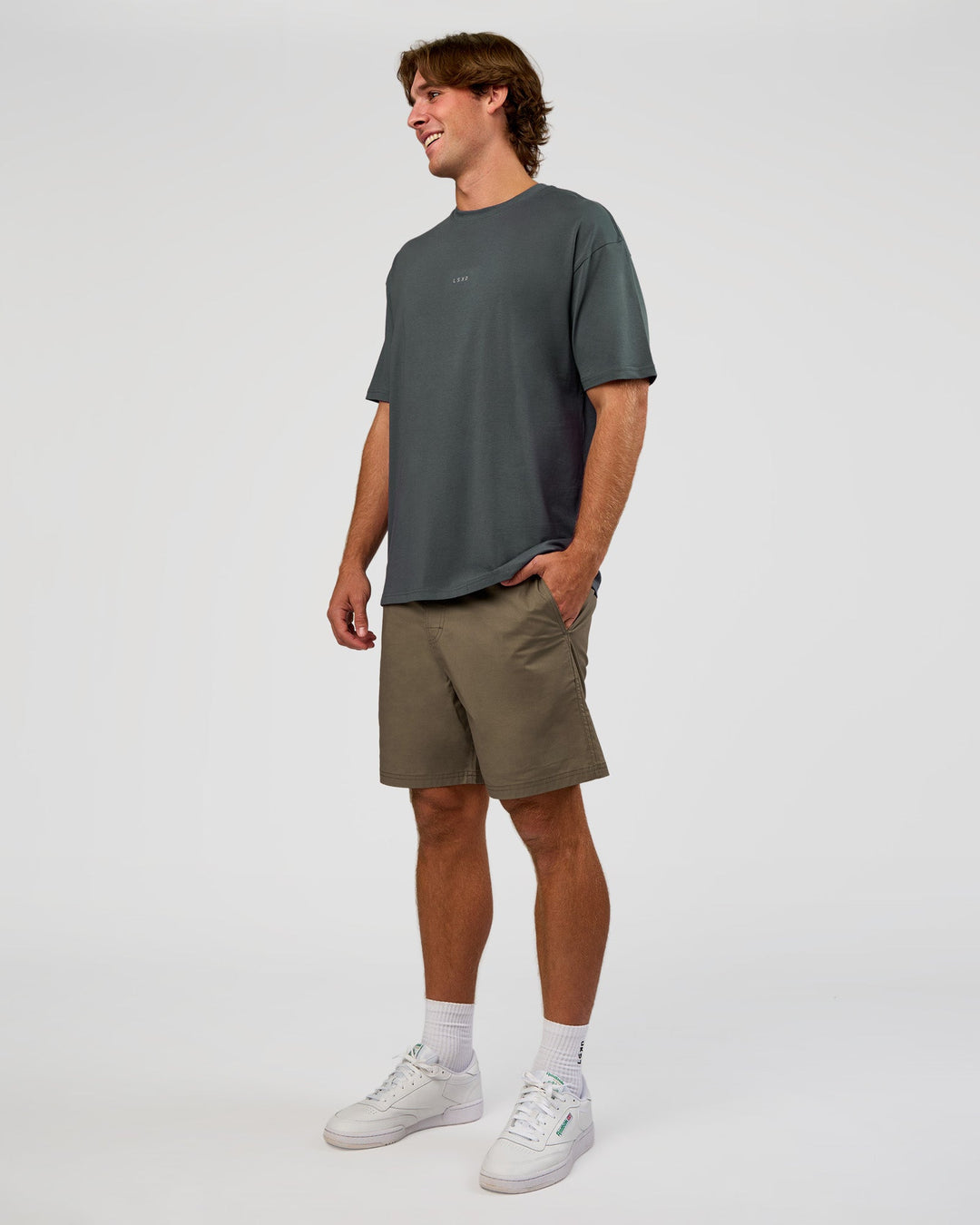 Man wearing Daily 7" Short - Walnut Grey | Model:Marcus | Size:L