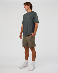 Man wearing Daily 7" Short - Walnut Grey | Model:Marcus | Size:L