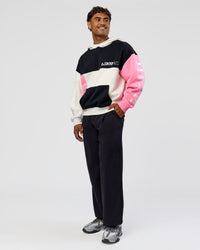 Man wearing Deconstructed Fleece Hoodie - Caviar-Candy Pink-Grey Marl | Model:Xav | Size:L