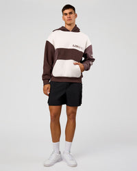 Man wearing Deconstructed Fleece Hoodie - Off White-Cocoa Powder-Choc | Model:Jackson | Size:L