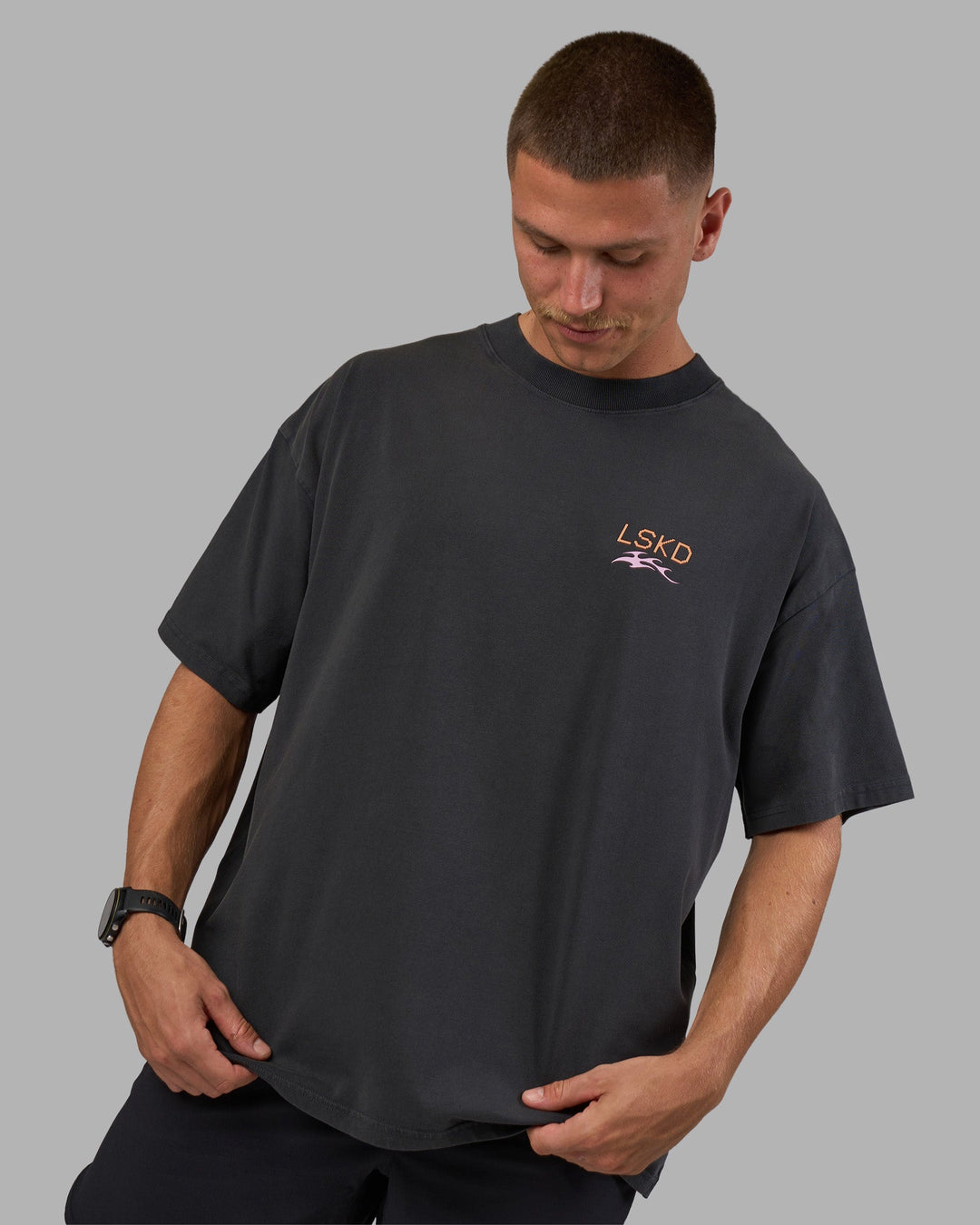 Man wearing Digital World Heavyweight Oversized Tee - Washed Black | Model:Nikola | Size:L