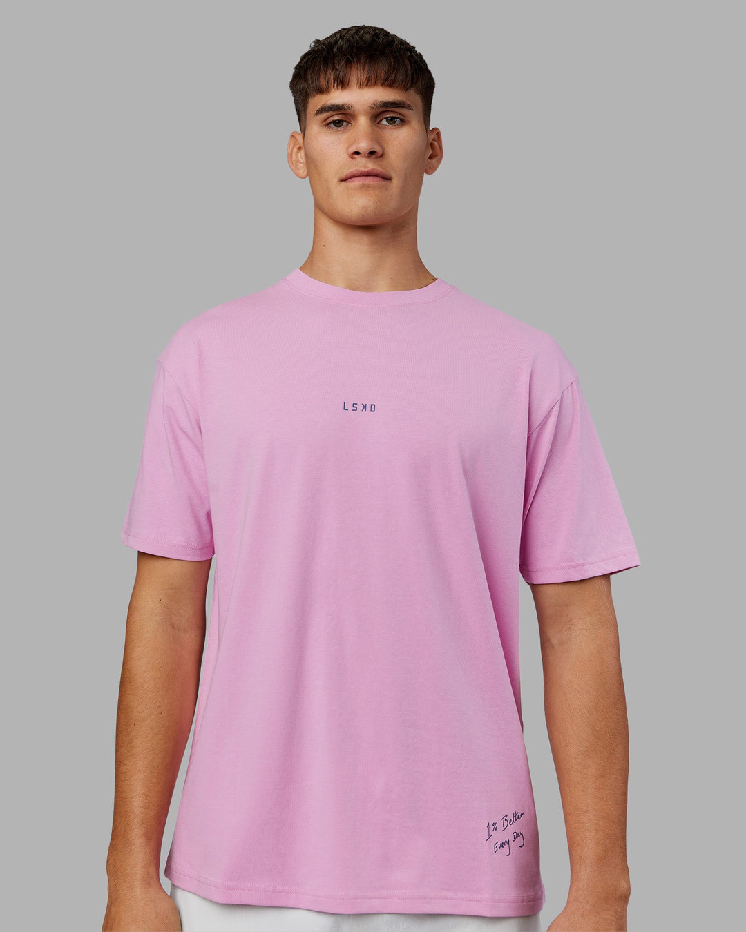 Man wearing ETJ Values FLXCotton Oversize Tee - Bubblegum-Indigo | Model:Jackson | Size:L