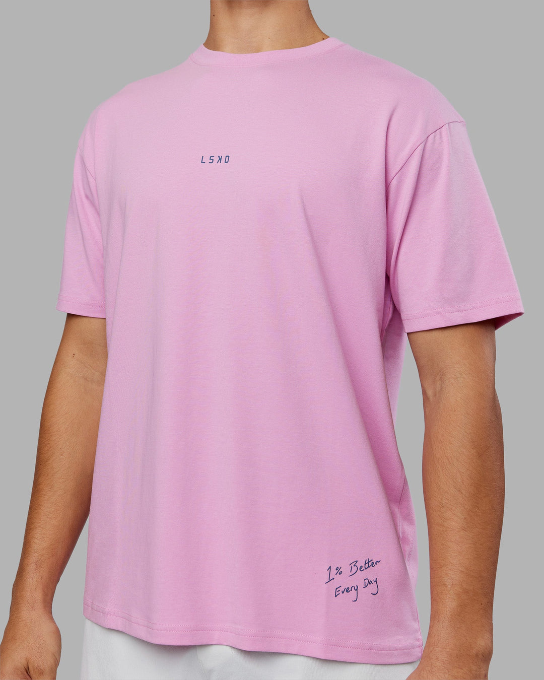 Man wearing ETJ Values FLXCotton Oversize Tee - Bubblegum-Indigo | Model:Jackson | Size:L
