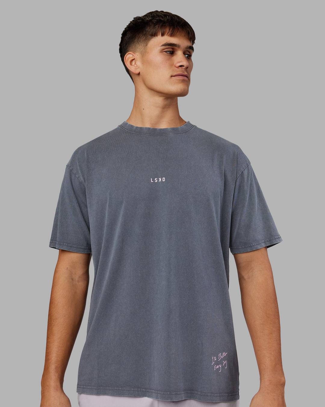 Man wearing ETJ Values FLXCotton Oversize Tee - Dark Grey Washed-Pink | Model:Jackson | Size:L