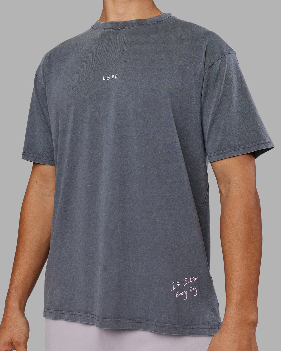 Man wearing ETJ Values FLXCotton Oversize Tee - Dark Grey Washed-Pink | Model:Jackson | Size:L