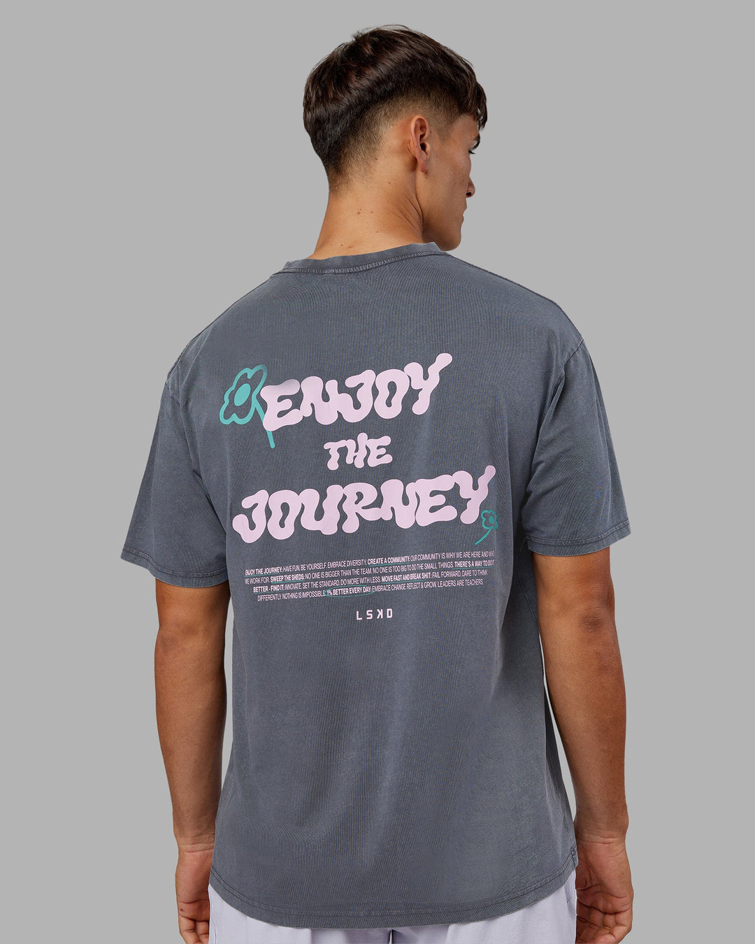 Man wearing ETJ Values FLXCotton Oversize Tee - Dark Grey Washed-Pink | Model:Jackson | Size:L