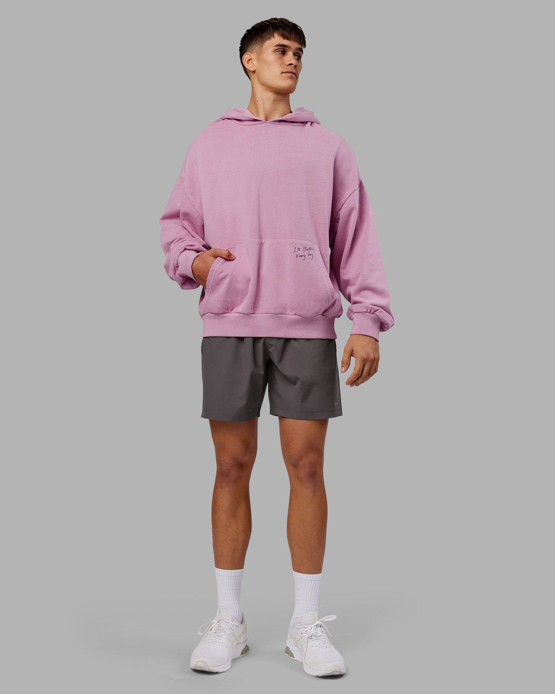 Man wearing ETJ Values Washed Unisex Oversize Hoodie - Bubblegum-Indigo | Model:Jackson | Size:L