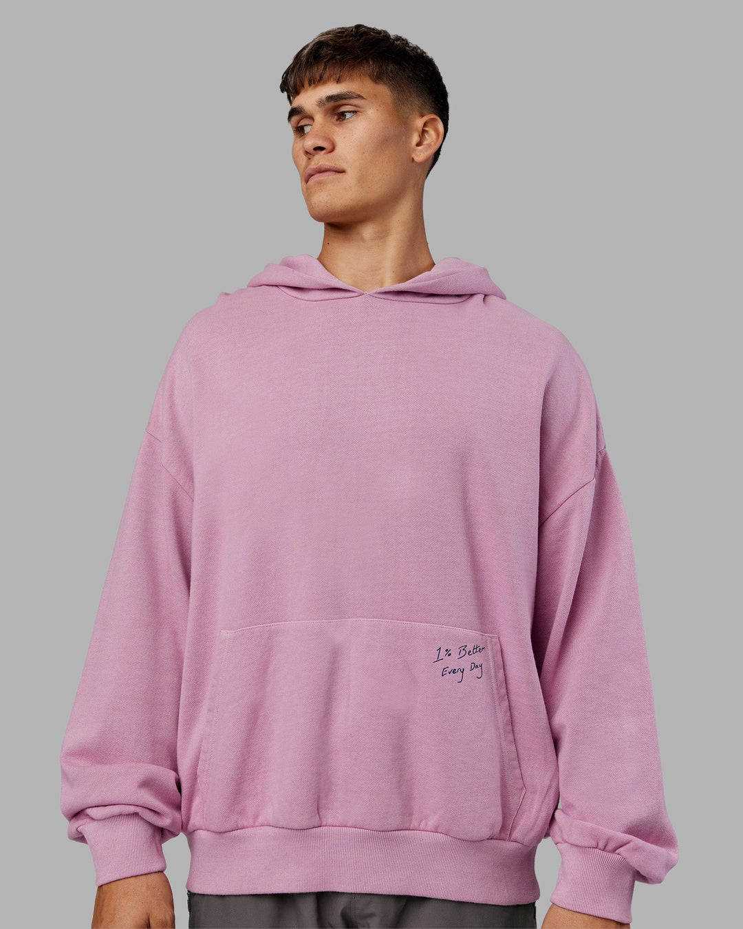 Man wearing ETJ Values Washed Unisex Oversize Hoodie - Bubblegum-Indigo | Model:Jackson | Size:L
