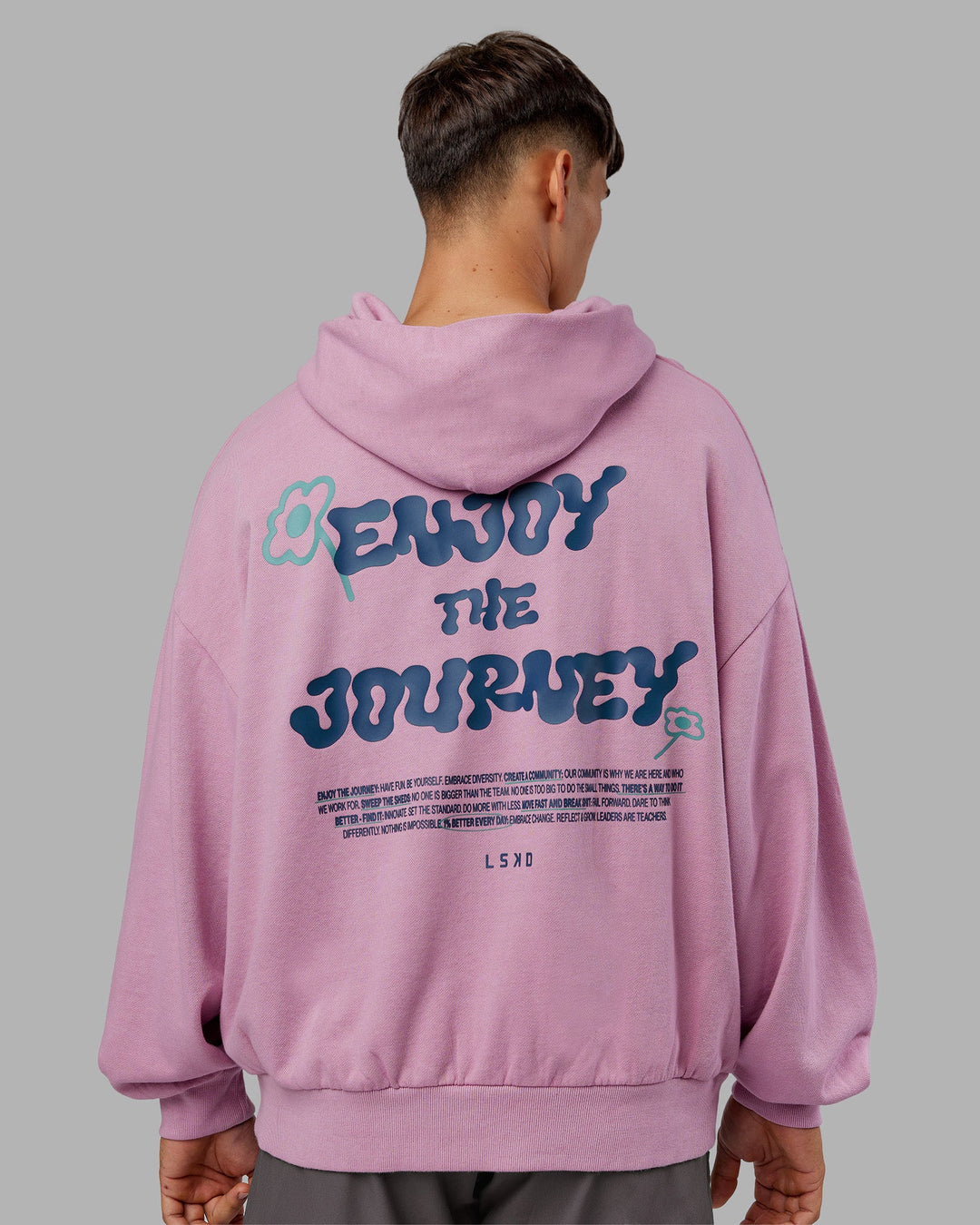 Man wearing ETJ Values Washed Unisex Oversize Hoodie - Bubblegum-Indigo | Model:Jackson | Size:L
