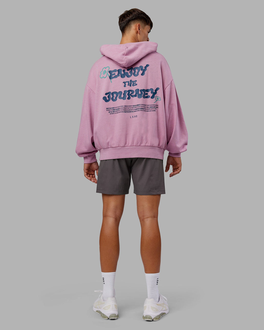 Man wearing ETJ Values Washed Unisex Oversize Hoodie - Bubblegum-Indigo | Model:Jackson | Size:L