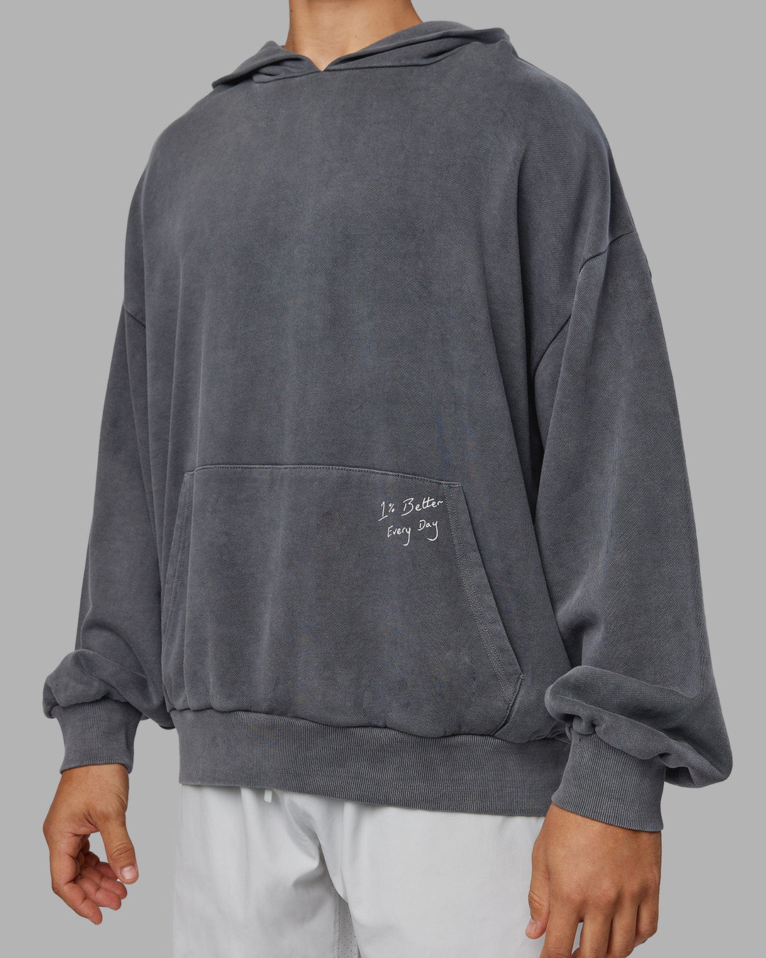 Man wearing ETJ Values Washed Unisex Oversize Hoodie - Dark Storm-Light Bubblegum | Model:Jackson | Size:L