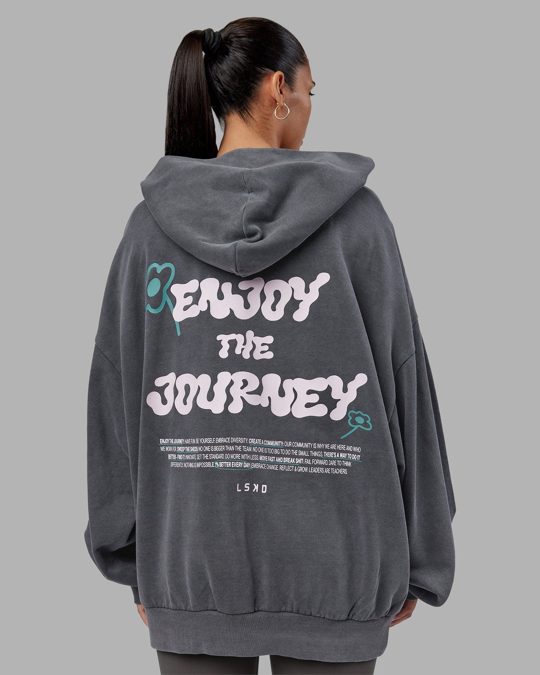 Woman wearing ETJ Values Washed Unisex Oversize Hoodie - Dark Storm-Light Bubblegum | Model:Rhiley | Size:L