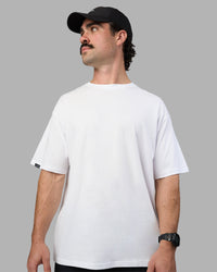 Man wearing Easy FLXCotton Tee Oversize - White | Model:Adam | Size:L