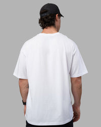 Man wearing Easy FLXCotton Tee Oversize - White | Model:Adam | Size:L