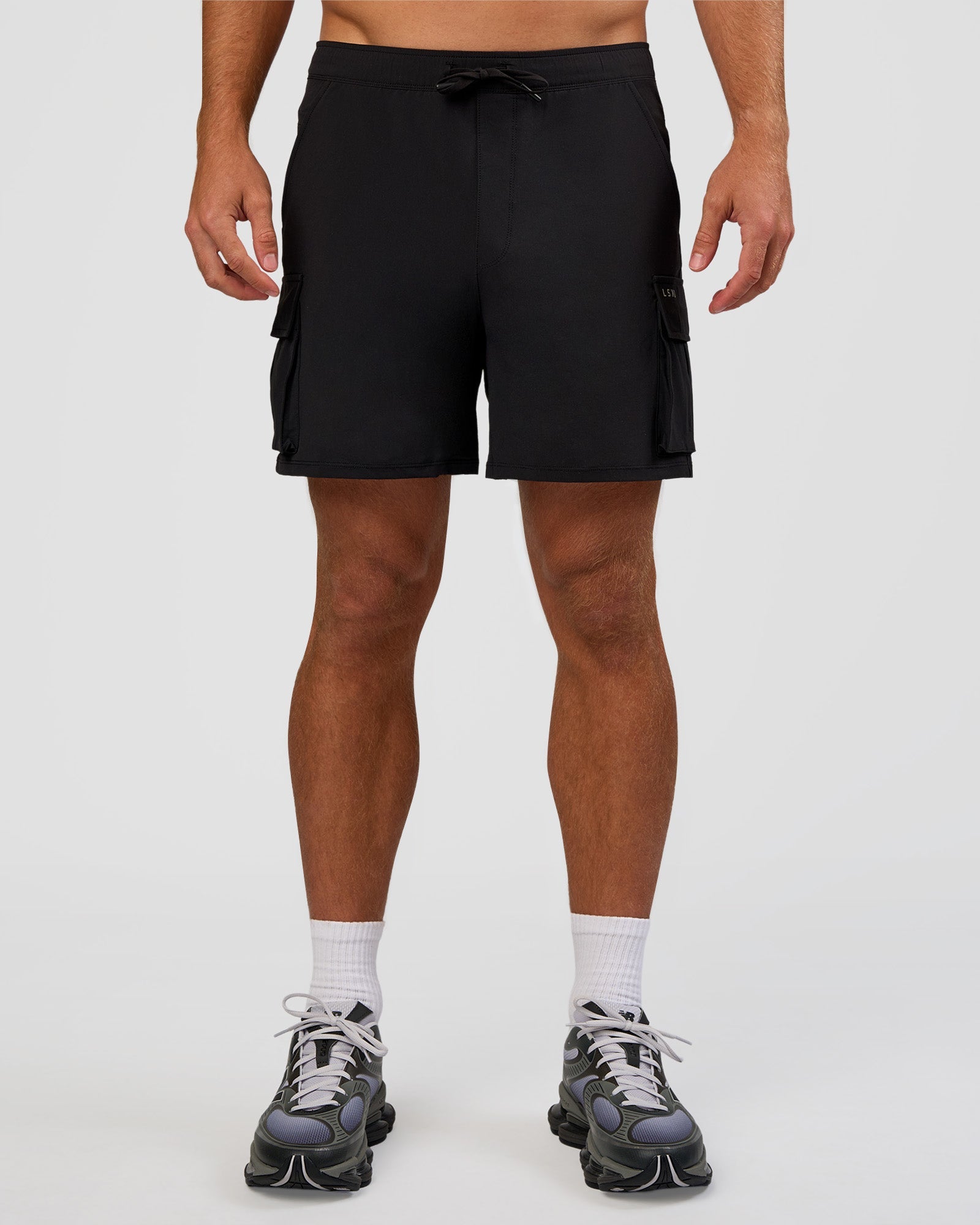 Man wearing Functional Cargo 6" Short - Black | Model:Marcus | Size:L