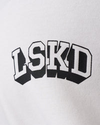 Woman wearing Grid FLXCotton Oversized Tee - White-Black | Model:Jordan | Size:L