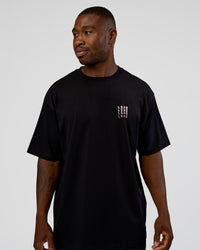 Man wearing Inferno Journey FLXCotton Oversized Tee - Black-Ultra Fuchsia | Model:Sam | Size:L