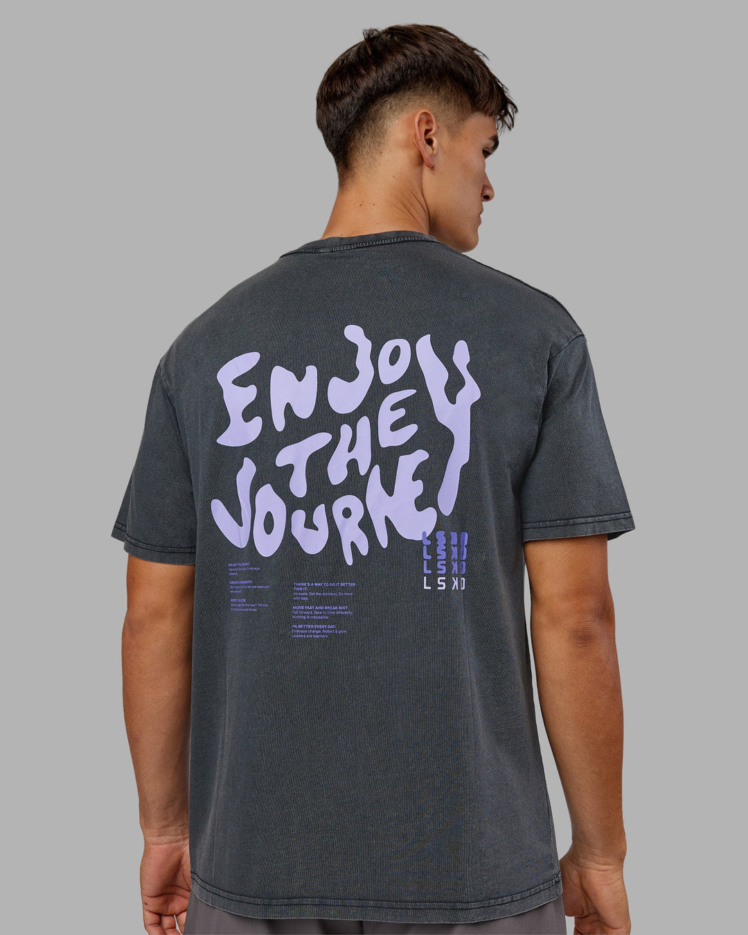 Man wearing Inferno Journey FLXCotton Oversized Tee - Black Washed-Violet Ray | Model:Jackson | Size:L