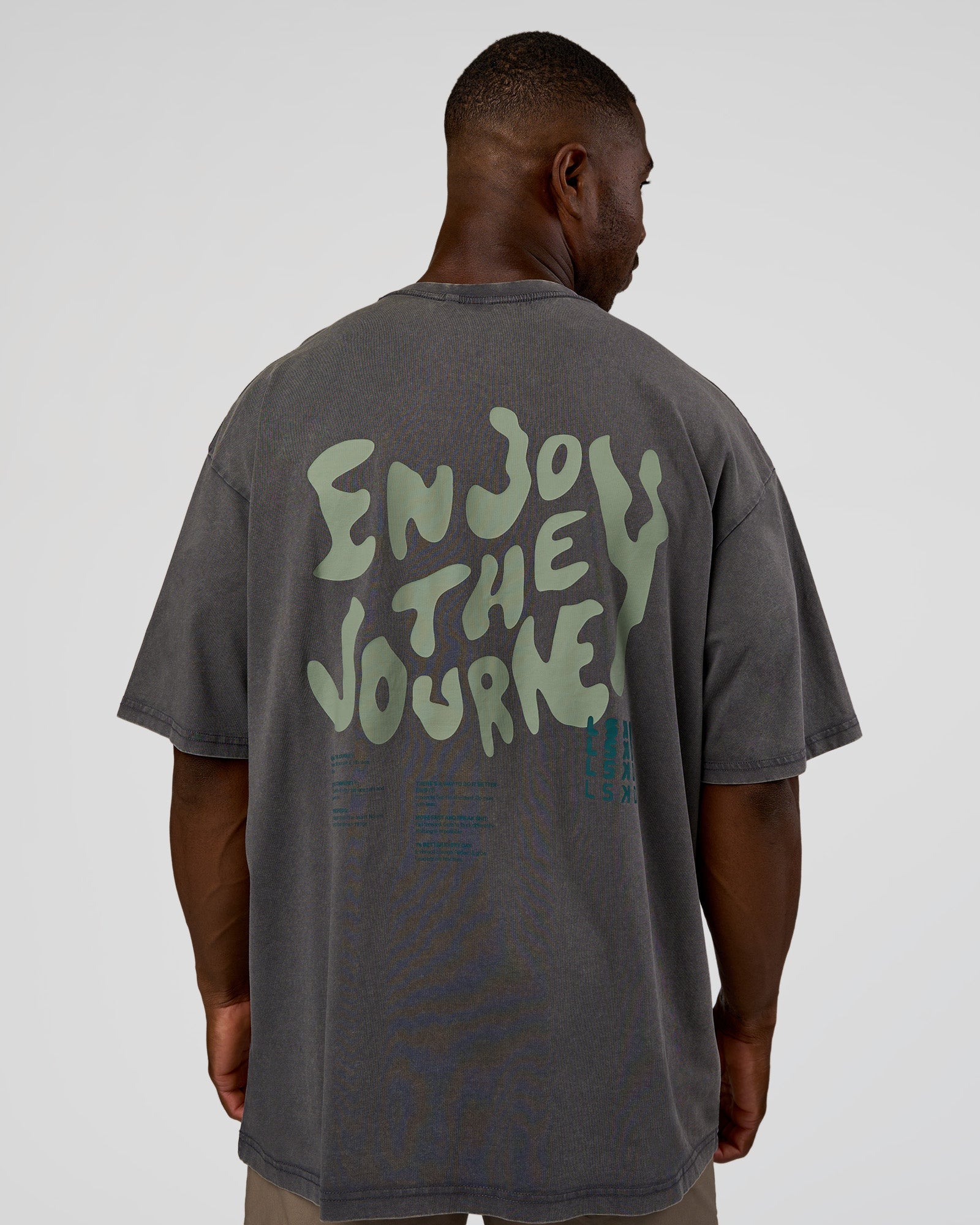 Man wearing Inferno Journey FLXCotton Oversized Tee - Dark Storm Washed-Iceberg Green | Model:Sam | Size:L