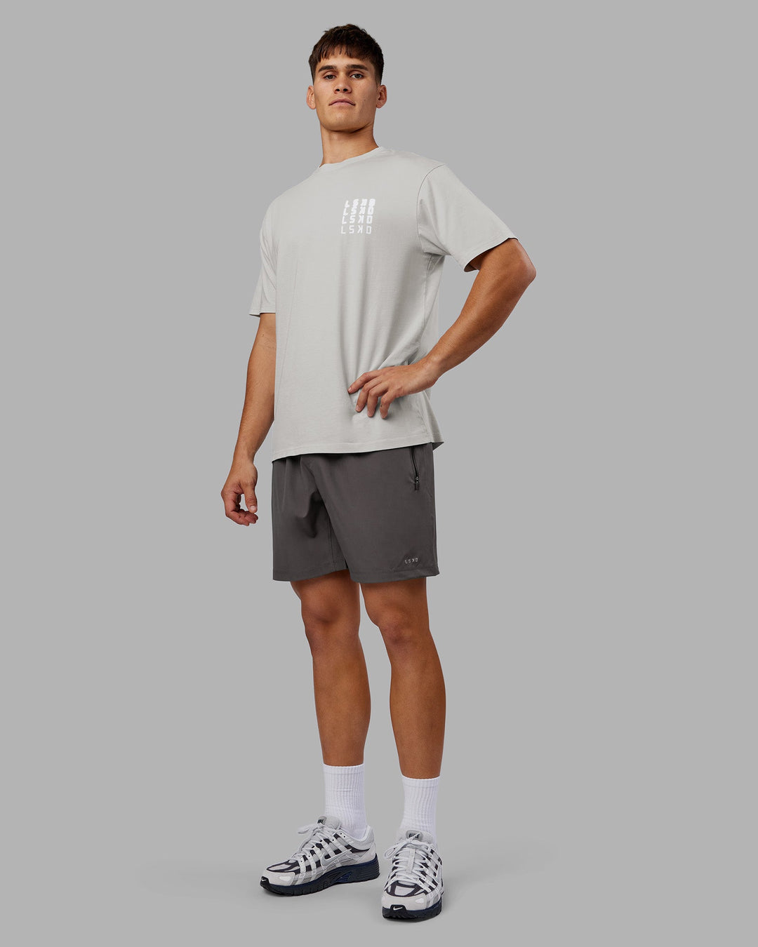 Man wearing Inferno Journey FLXCotton Oversized Tee - Digital Mist Washed-White | Model:Jackson | Size:L