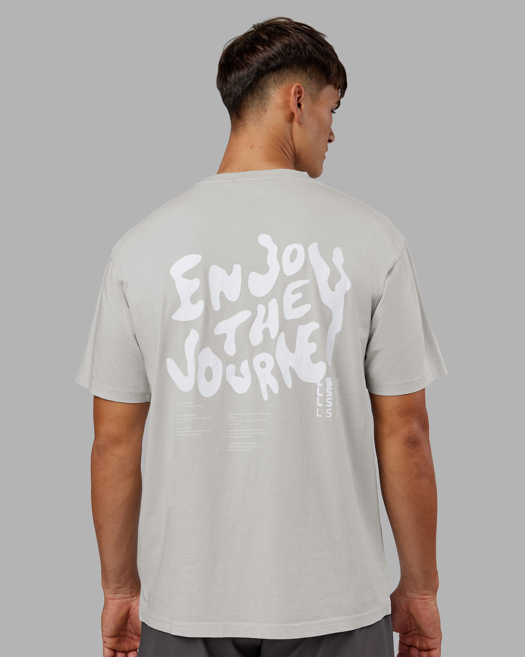 Man wearing Inferno Journey FLXCotton Oversized Tee - Digital Mist Washed-White | Model:Jackson | Size:L
