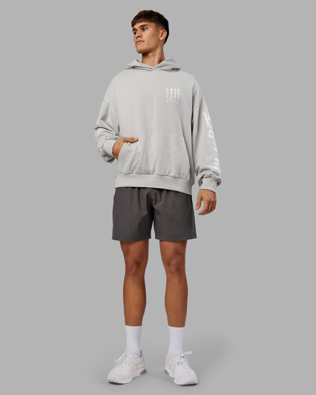 Man wearing Journey Washed Unisex Oversize Hoodie - Digital Mist-White | Model:Jackson | Size:L