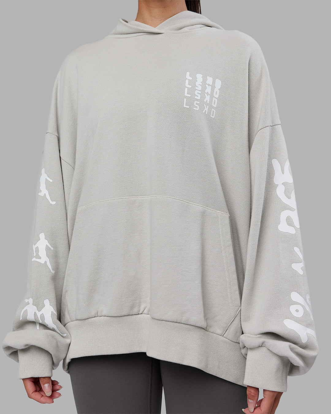 Woman wearing Journey Washed Unisex Oversize Hoodie - Digital Mist-White | Model:Rhiley | Size:L