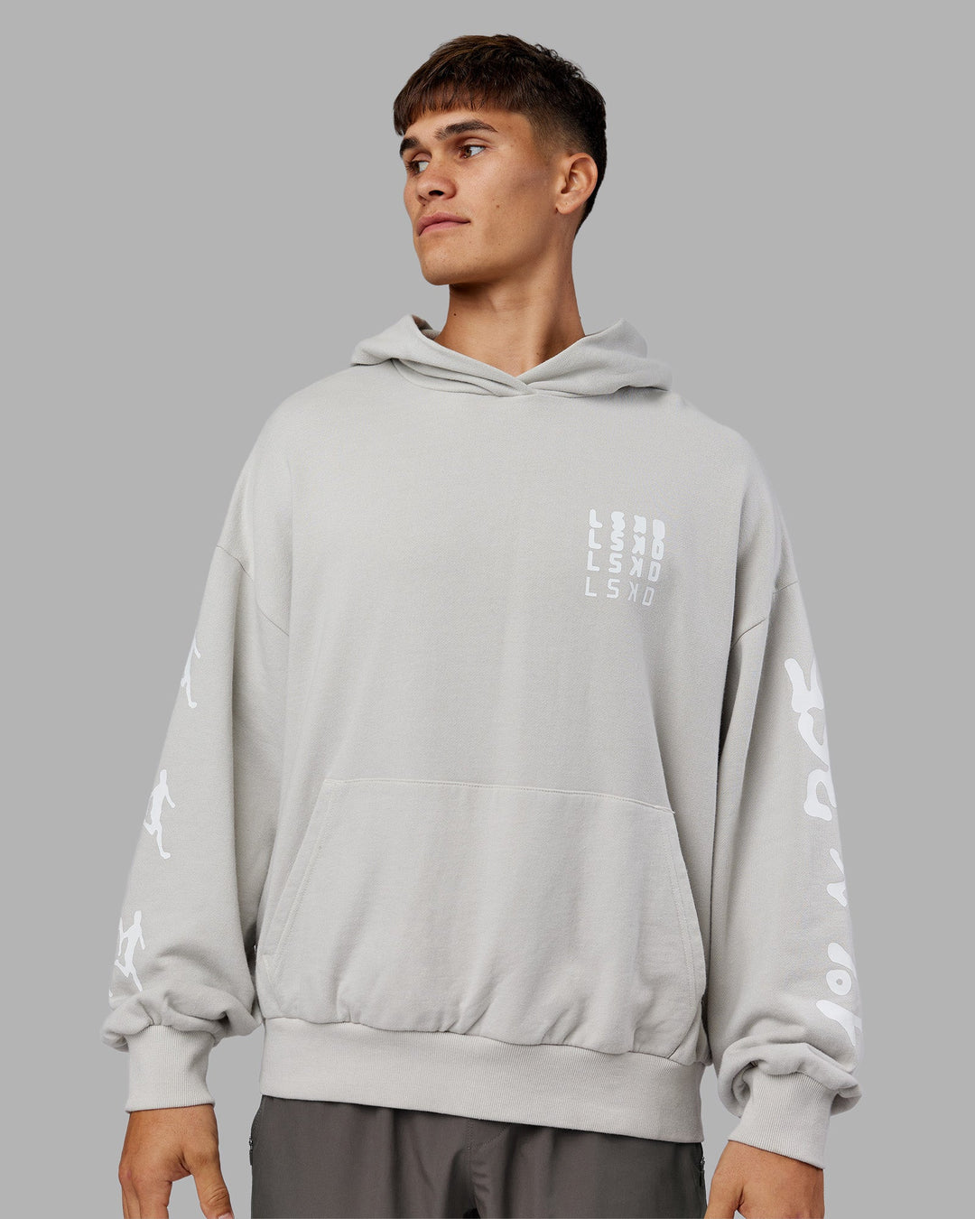 Man wearing Journey Washed Unisex Oversize Hoodie - Digital Mist-White | Model:Jackson | Size:L