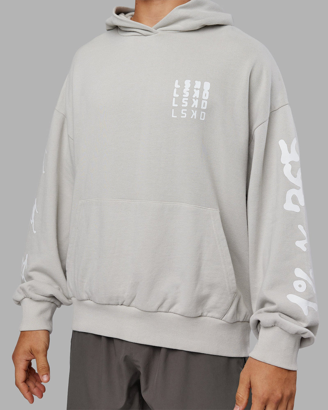 Man wearing Journey Washed Unisex Oversize Hoodie - Digital Mist-White | Model:Jackson | Size:L