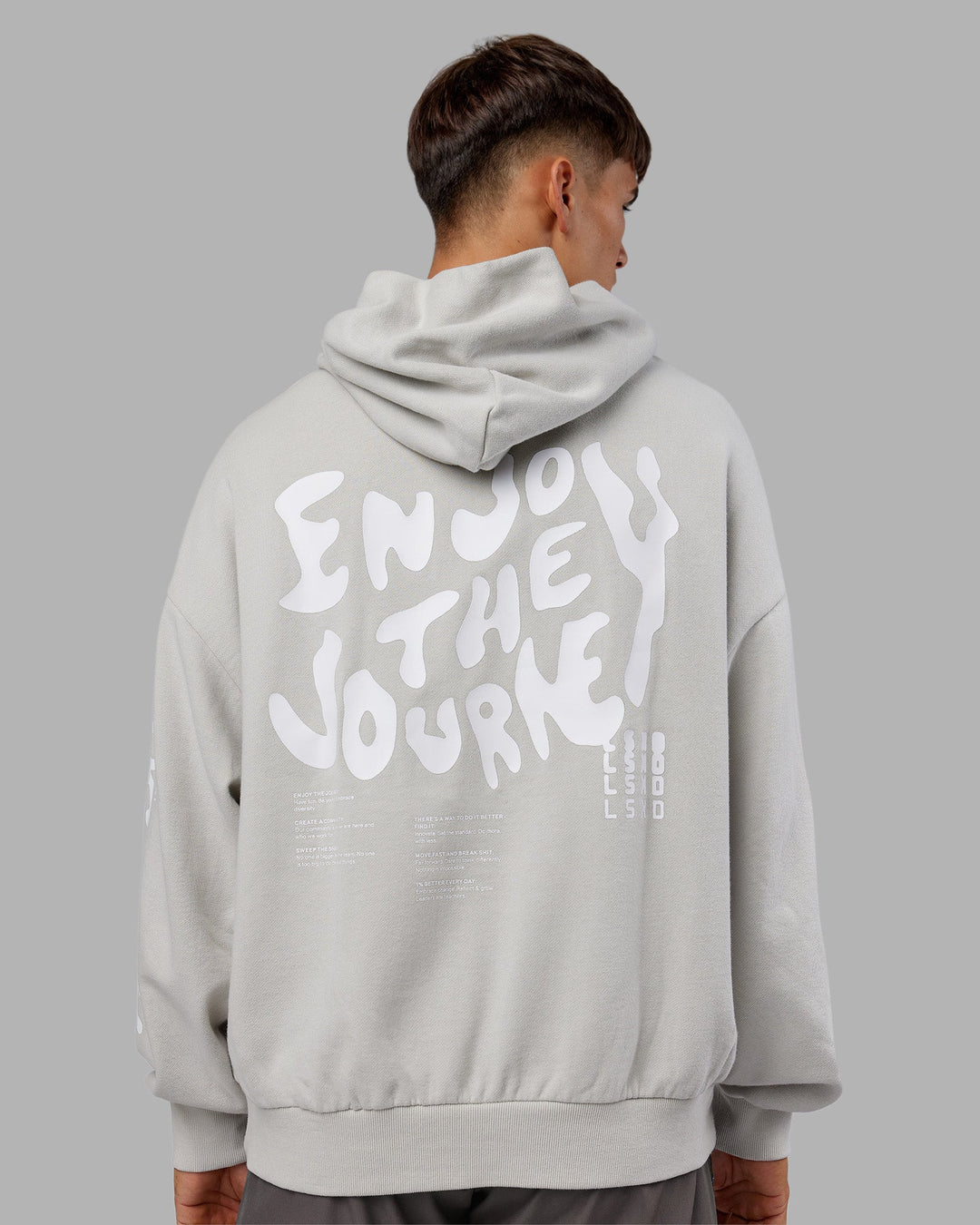 Man wearing Journey Washed Unisex Oversize Hoodie - Digital Mist-White | Model:Jackson | Size:L