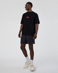 Man wearing Kettle B FLXCotton Oversized Tee - Black-White | Model:Paabio | Size:L