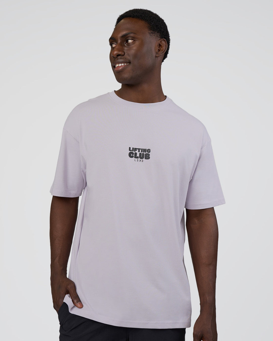 Man wearing Kettle B FLXCotton Oversized Tee - Galactic Lilac-Black | Model:Paabio | Size:L