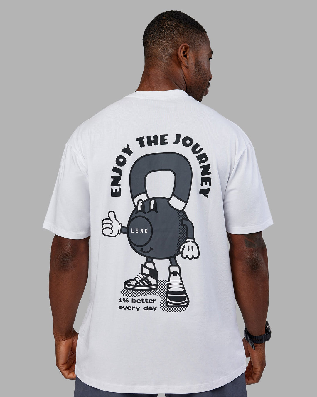 Man wearing Kettlebell FLXCotton Oversized Tee - White-Black | Model:Sam | Size:L