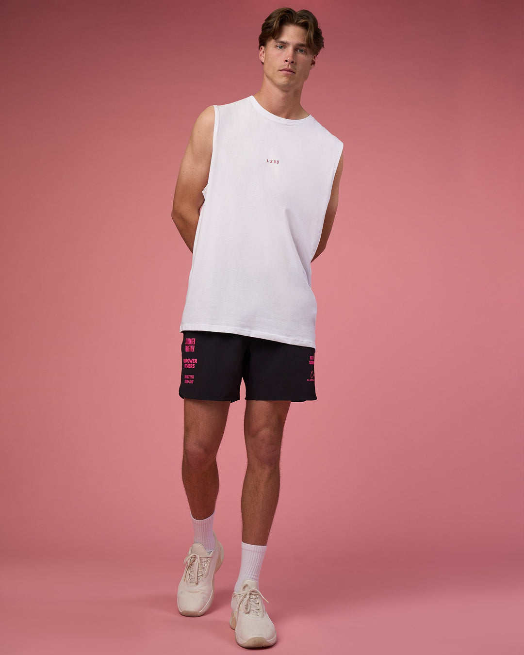 Man wearing Lift 6&quot; Short - Black-Ultra Pink | Model:Brandon | Size:L