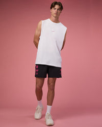 Man wearing Lift 6" Short - Black-Ultra Pink | Model:Brandon | Size:L